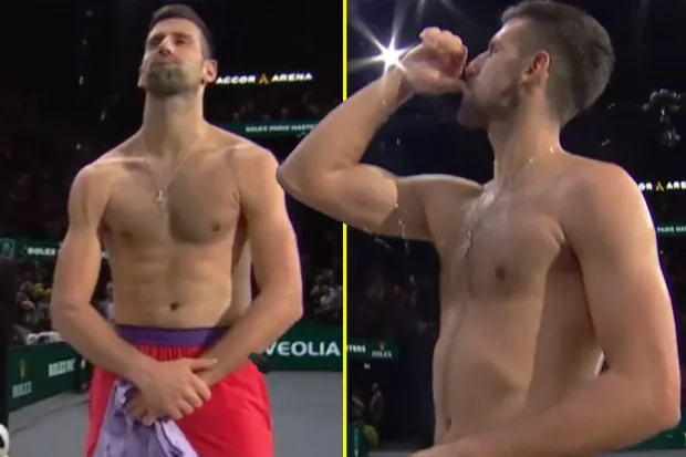 Topless Novak Djokovic sees camera and shows off ripped physique with bicep move