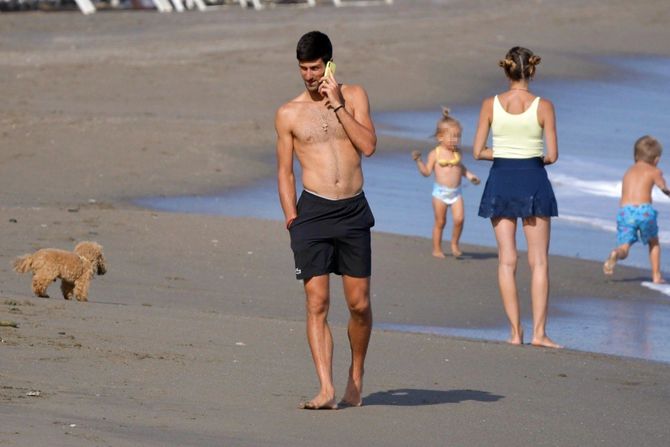 They say I beat my wife… Novak Djokovic sits on the beach & they tell him he is not helping children”