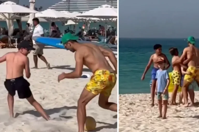 Novak Djokovic having fun in Dubai playing soccer on the beach with some kids