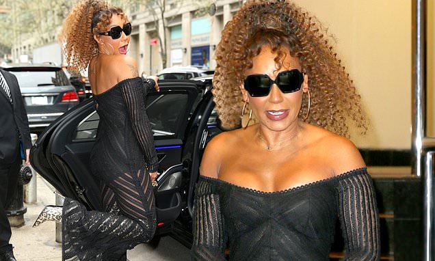Mel B flashes her cleavage in a see-through jumpsuit and cheetah-print boots a day after she ‘walked out’ of an interview on US breakfast show Today