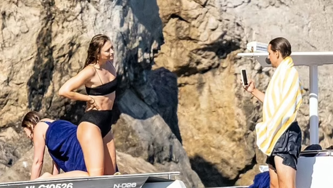 maria sharapova looks stunning in a black bikini while enjoying a day on boat in nerano, italy